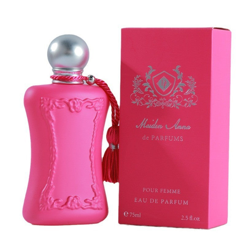 Pink Velvet Luxury Perfume bottle with elegant design against a soft pink background.