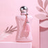 Pink Velvet Luxury Perfume bottle with elegant design against a soft pink background.